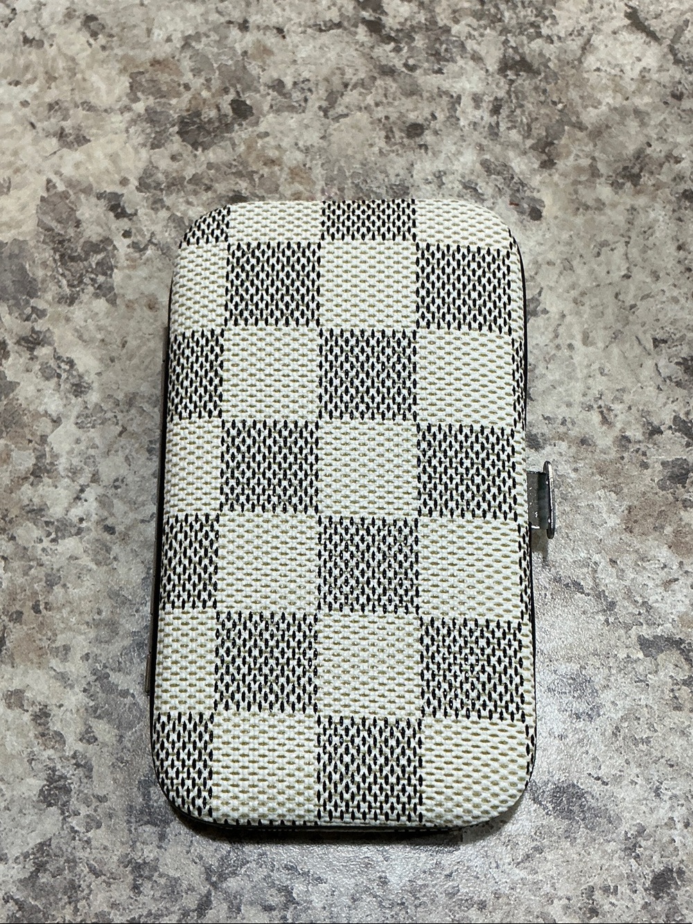 Checker Pattern Case with  8-piece manicure and pedicure grooming kit set.